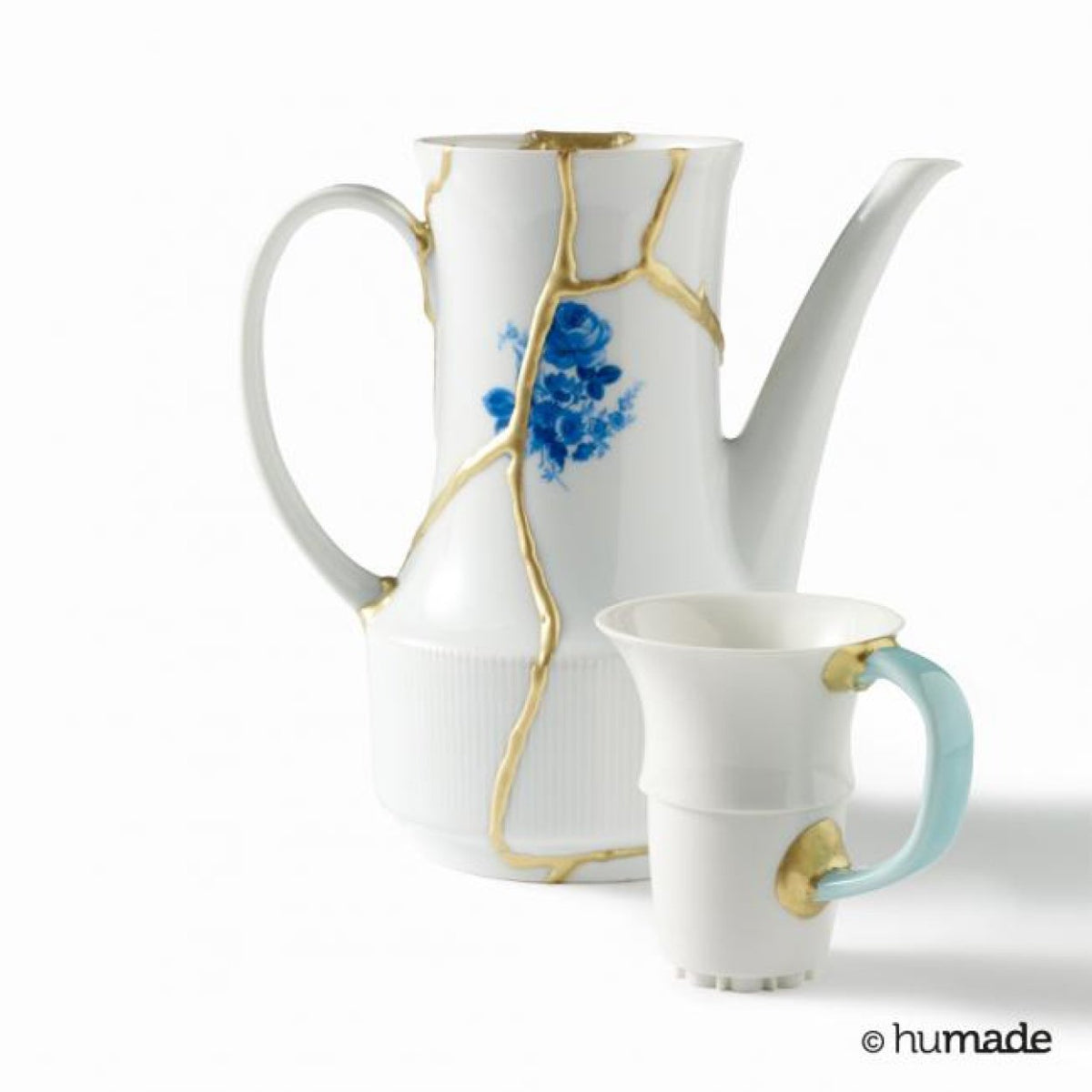 Kintsugi reparatie met goudpoeder en lijm op keramiek Humade - SuperMatique